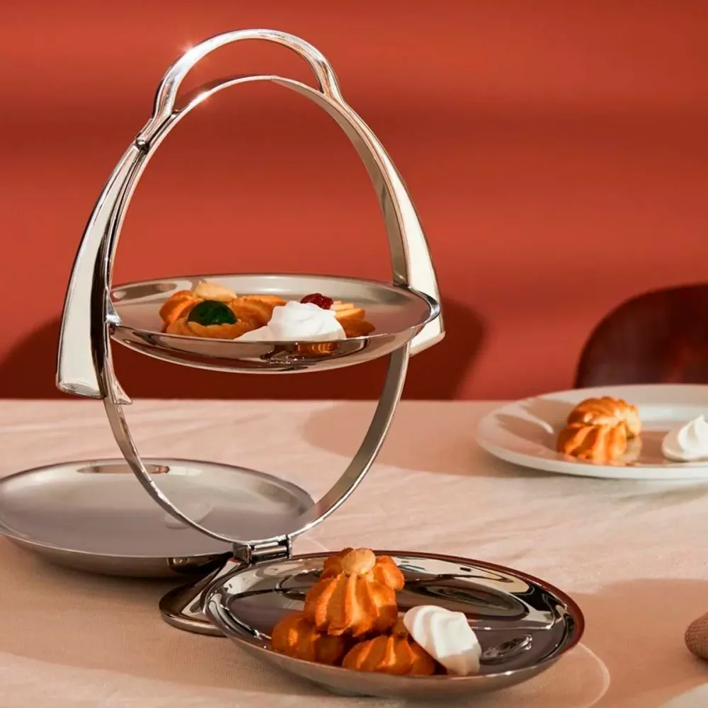 Vassoio espositore pieghevole acciaio inox Anna Gong di Alessi