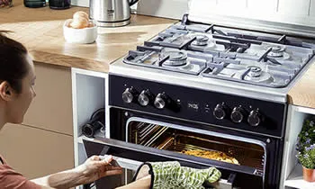 Beko Cucina Gas 4 Fuochi Forno Elettrico Larghezza Per Profondità 50x50 Cm Con Coperchio Colore Silver CSS42014FS 54 Litri