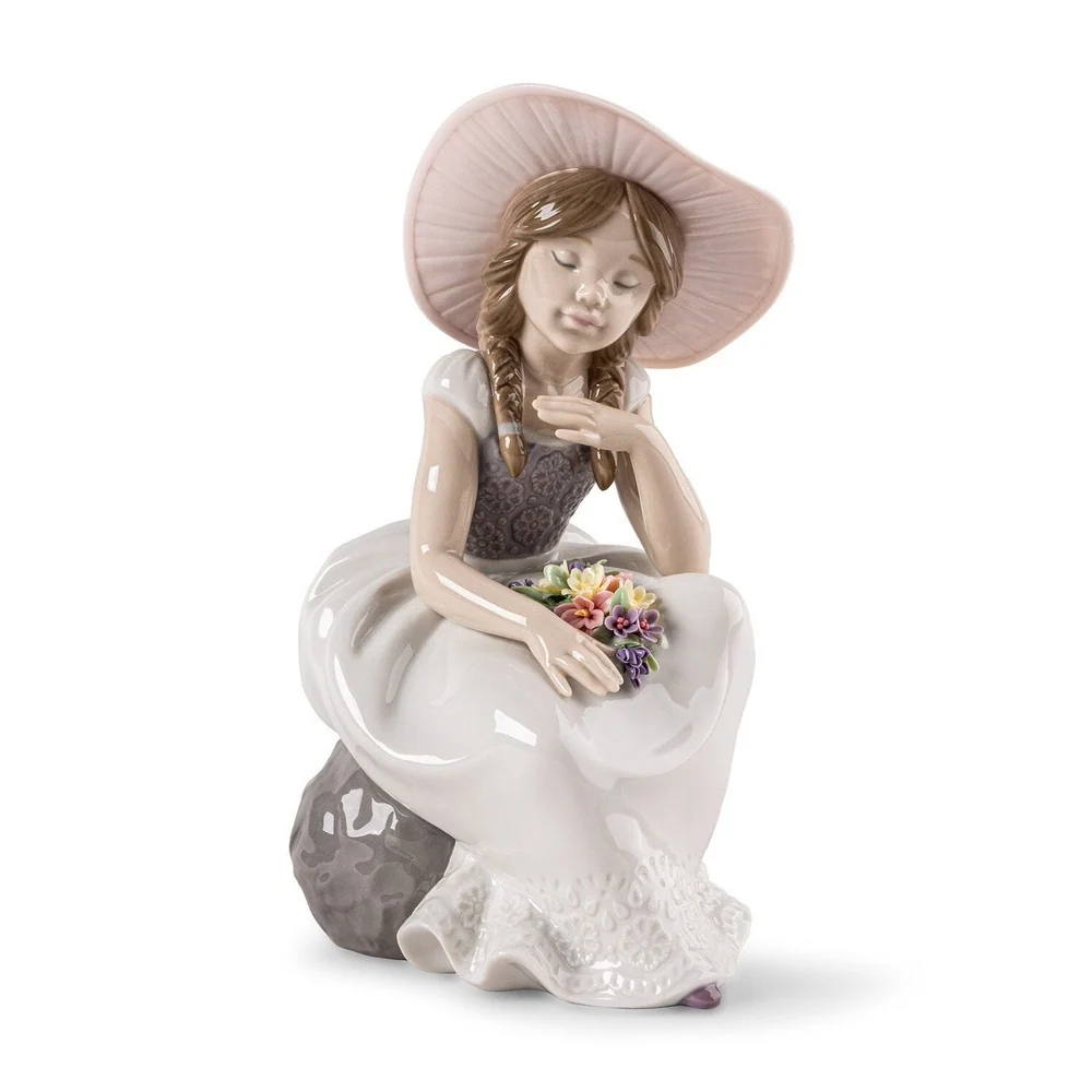 Scultura Bimba è Arrivata la Primavera Lladrò