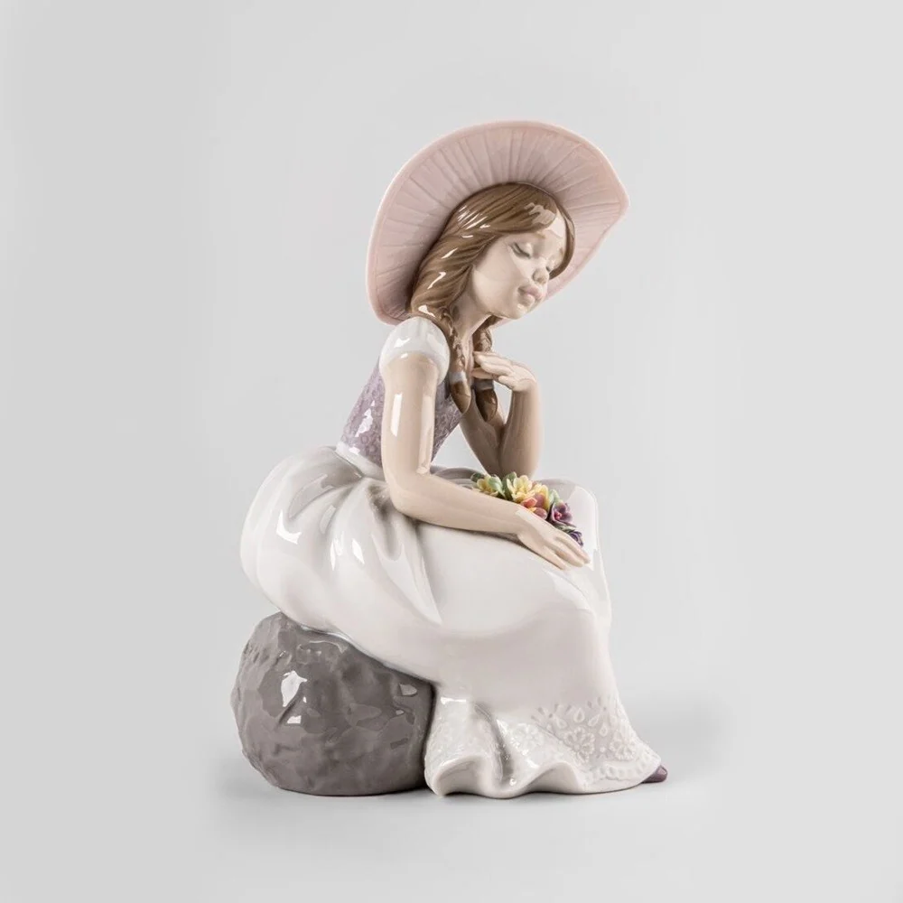 Scultura Bimba è Arrivata la Primavera Lladrò