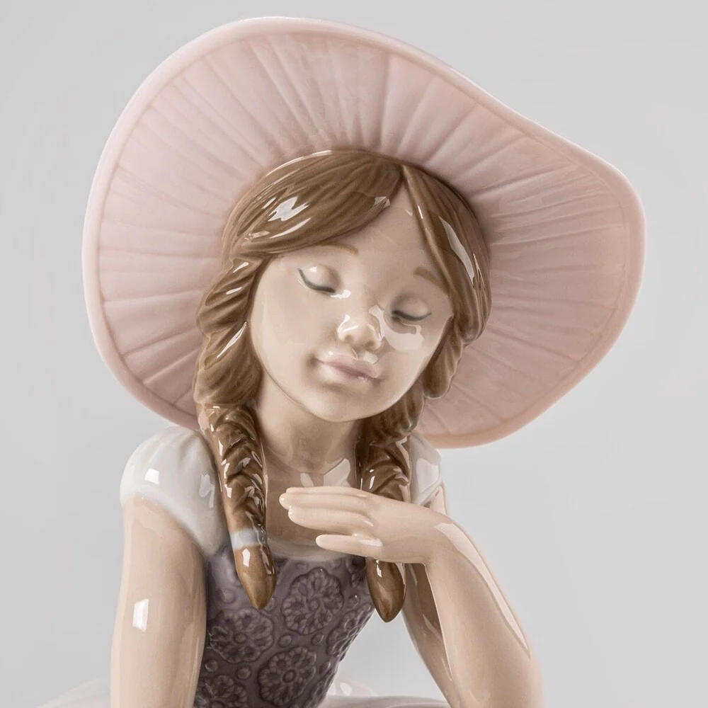Scultura Bimba è Arrivata la Primavera Lladrò